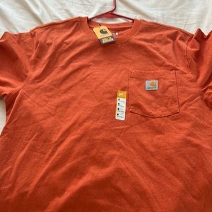 Carhartt . Brand new… or orange color. Cotton tee